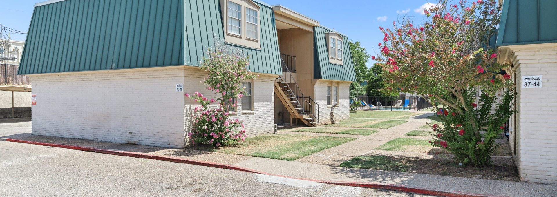 the apartment complex has two buildings with green roofs at The Crestwood Terrace