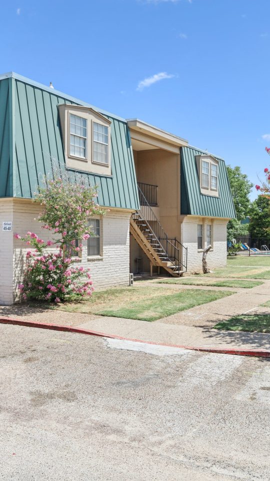 the apartment complex has two buildings with green roofs at The Crestwood Terrace